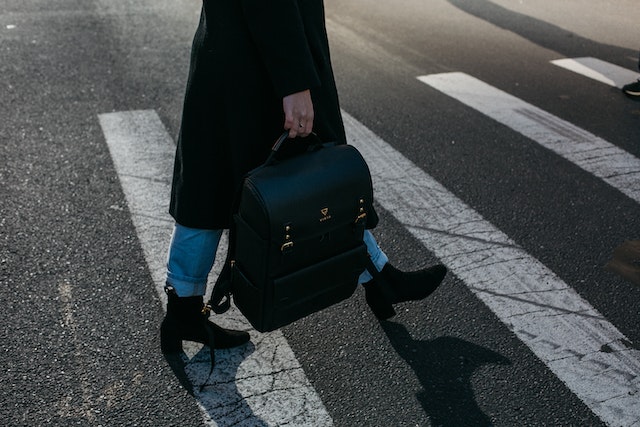 person walking in crosswalk