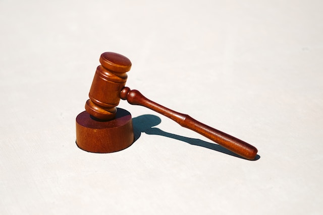 brown gavel on white background